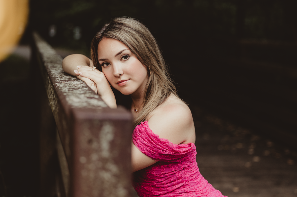 Rosary College Prep senior in a pink dress during her senior portrait session in the Chicago suburbs